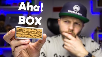 How to open the Aha! puzzle box?