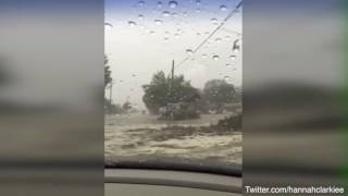 Car trapped in floods Cyclone Enawo