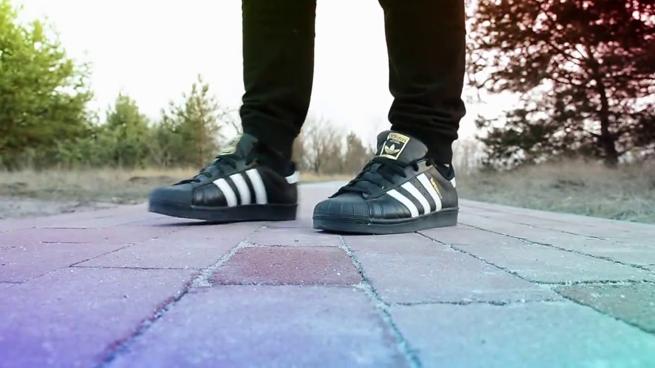 wearing adidas superstar