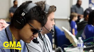 Blind student broadcaster provides color commentary for Delaware Blue Coats