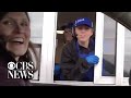 School administrator goes to drive-thru where student is working to tell her she's valedictorian