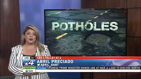 City repairs road with potholes