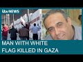 Moment innocent civilian brandishing white flag in Gaza &#39;safe zone&#39; is shot dead | ITV News