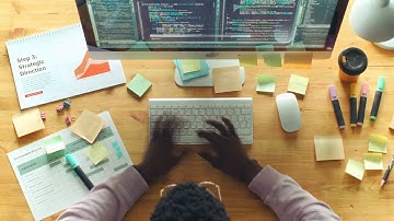 Time Lapse Of Programmer Coding On Computer At Office Desk l HD l Footage