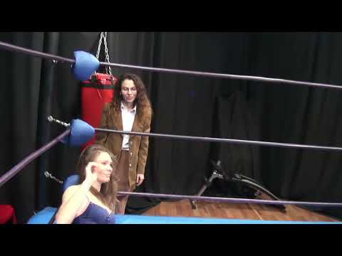 female wrestling low blow