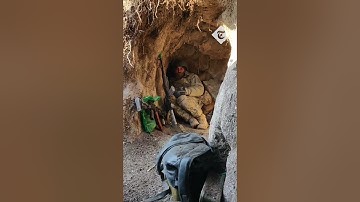 Ukrainian soldiers barely avoid Russian bomb as they hide in a trench