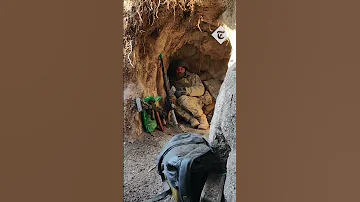 Ukrainian soldiers barely avoid Russian bomb as they hide in a trench