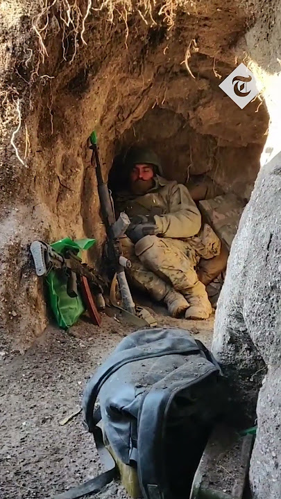 Ukrainian soldiers barely avoid Russian bomb as they hide in a trench