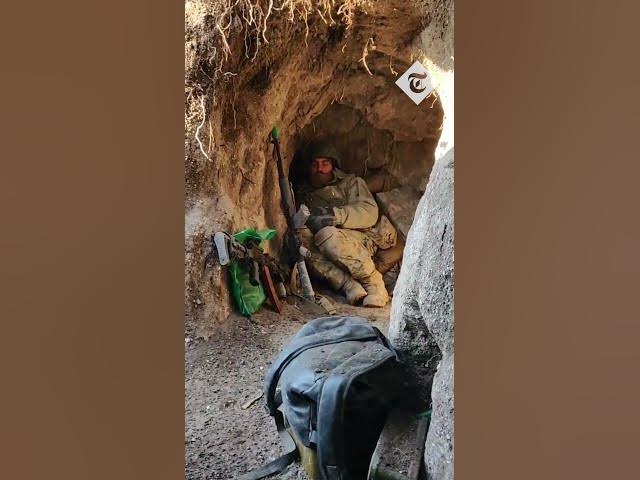 Ukrainian soldiers barely avoid Russian bomb as they hide in a trench