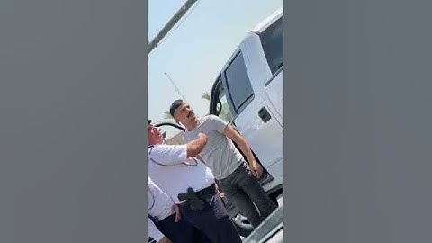 مواطن يعتدي على شرطي مرور في بغداد