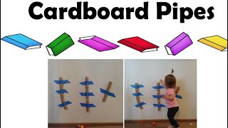 Toddler play cardboard pipe maze with Miss Jen and Miss Lindsey