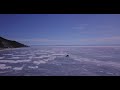 8 Бесплатное видео 4K с дрона. Free 4K video.Frozen lake Deep blue ice, cracked mountains.
