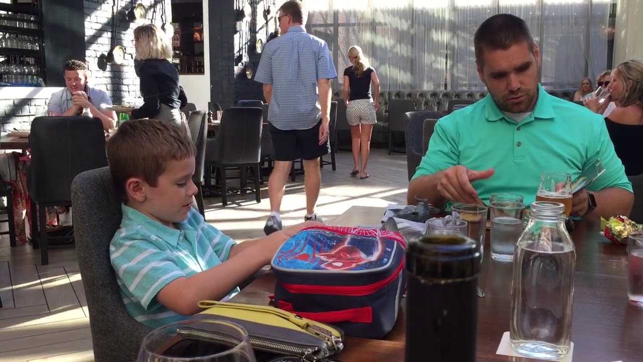 Blake opening his book from Aunt Corey