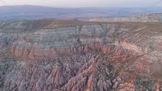 Goreme, Nevsehir, Turkey. Aerial view of Red Valley during sunset with dramatic lighting on uniqu...