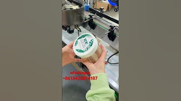 #Roundbottlelabelingmachine + automatic bottle cap flat labeling machine #labelingmachine