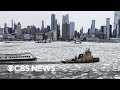 Drone footage shows ice-filled Hudson River as New York grapples with extreme cold