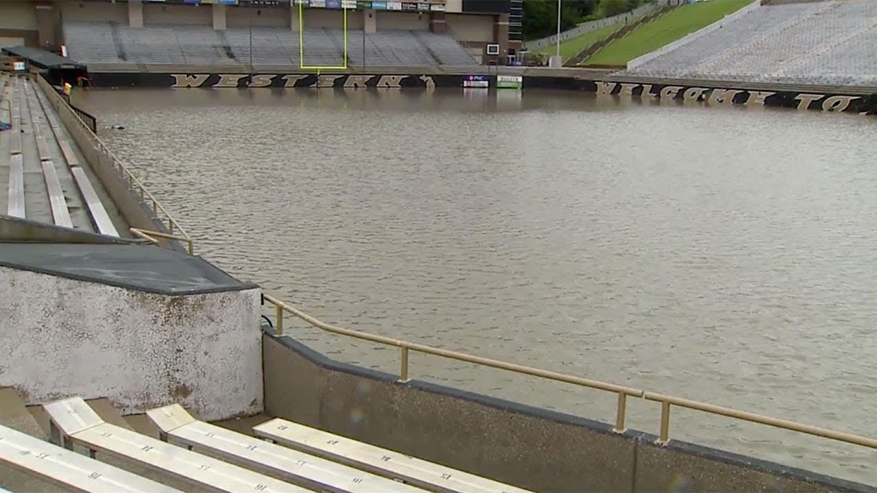 newspaper mockup Floodwaters fill university's football stadium like bathtub