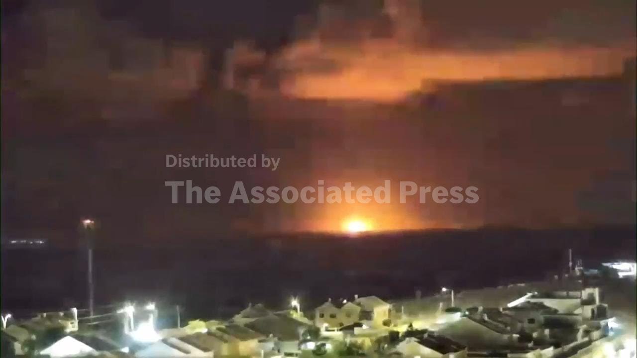 Explosions light up Gaza skyline
