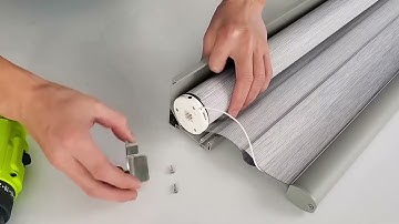 How to reverse roll for zebra blinds to feed/retract from the front of the roller ?
