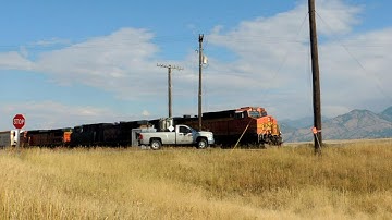 BNSF train roars through Bozeman, MT with CSX power!