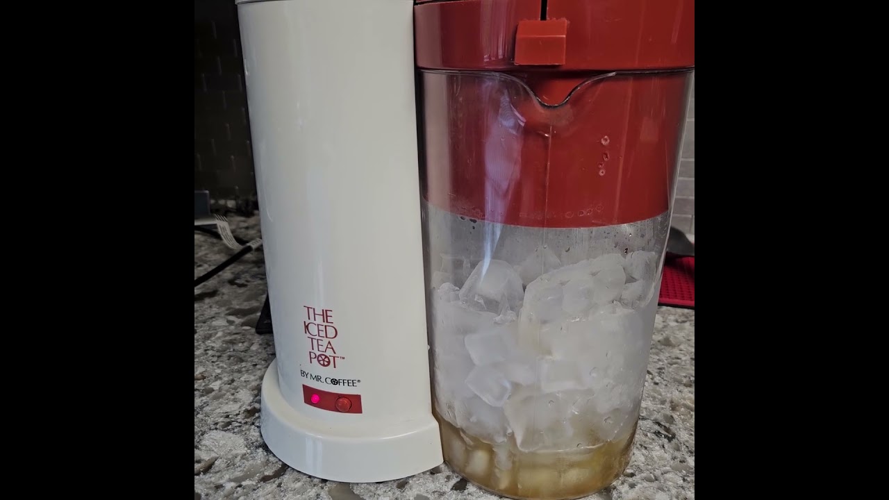 The Iced Tea Pot by Mr. Coffee Red 2 Qt Pitcher Ice Tea Maker Model TM1 -  surprisingly easy.