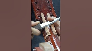Perfect repair a red Gibson broken headstock