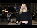elle fanning flashes her abs at lax