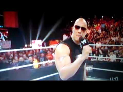 After 7 years, The Rock returns comes back to WWE in Anaheim to tell the world he is hosting WWE Wrestlemania. He let's everyone know John Cena is a pansy for coming up with "You Can't See Me"! The Rock is better then ever. He's Baaaaaack! I do not own this footage. Copyright Disclaimer Under Section 107 of the Copyright Act 1976, allowance is made for "fair use" for purposes such as criticism, comment, news reporting, teaching, scholarship, and research. Fair use is a use permitted by copyright statute that might otherwise be infringing. Non-profit, educational or personal use tips the balance in favor of fair use