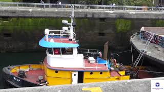 On Monday June 19th I saw Western Towboat co Tug Boat Pulling a Barge Through the Locks