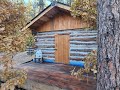 Small cabin in the woods start to finish  1 year build  with solar lights installed