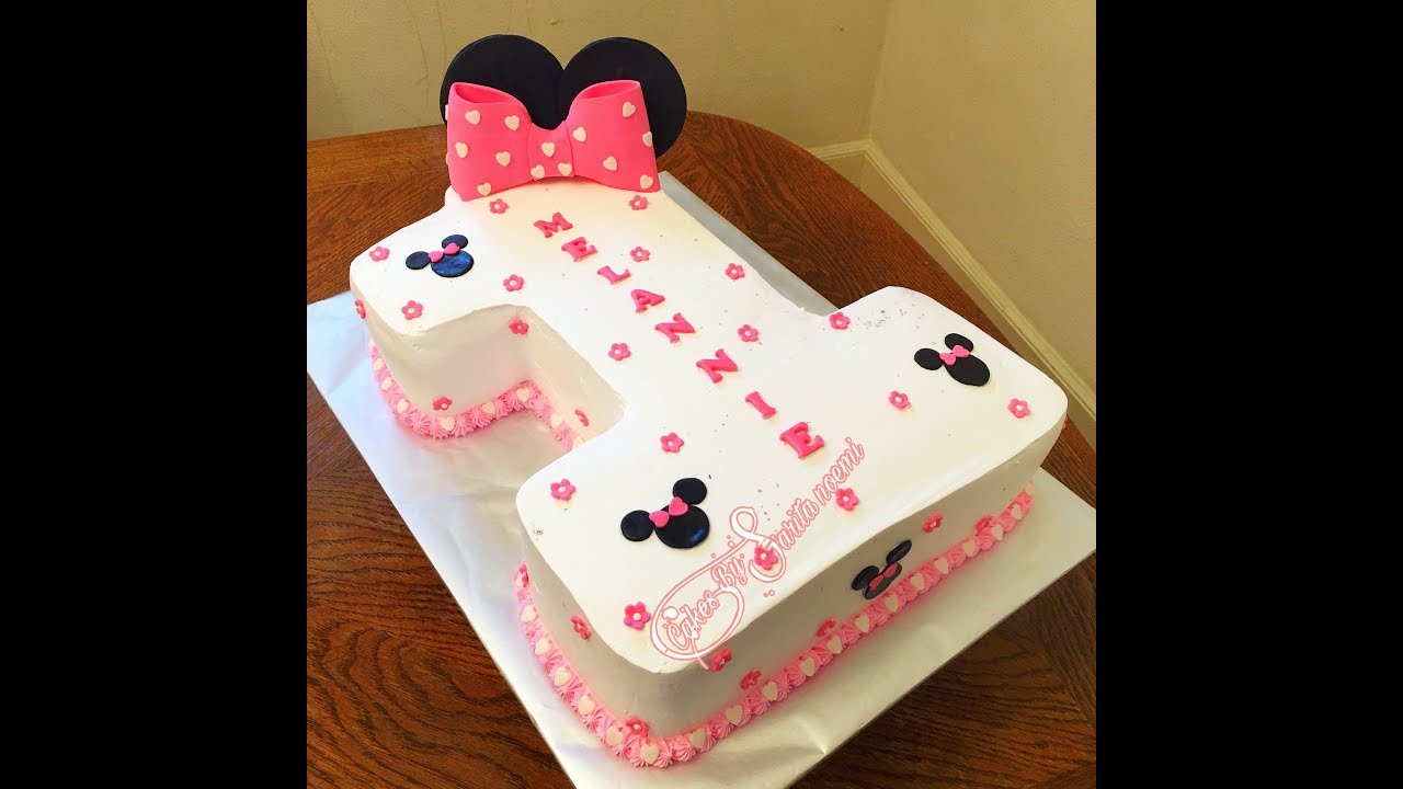 How To Decorate A Minnie Mouse Cake Como Decorar Un Pastel En Forma De Numero Uno De Minnie Mouse Youtube
