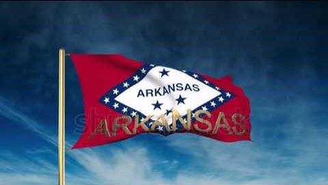 arkansas flag slider style with title. Waving in the wind with cloud background animation Stock