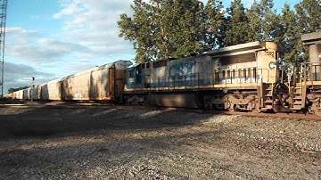 CSX 378 & 7592 creep over the diamond with loaded Autoracks