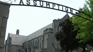 Woman: Priest accused of abuse is suing her for speaking out