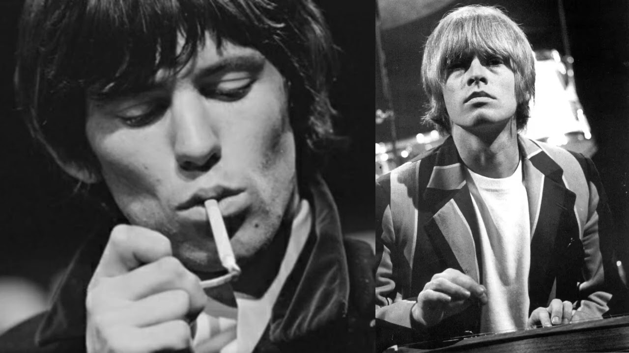 Brian Jones plays the dulcimer supported by Keith Richards on acoustic guitar on I Am Waiting