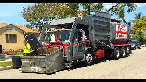 Volvo WXLL- Amrep Octagonal Front Loader: Manual Trash Collection