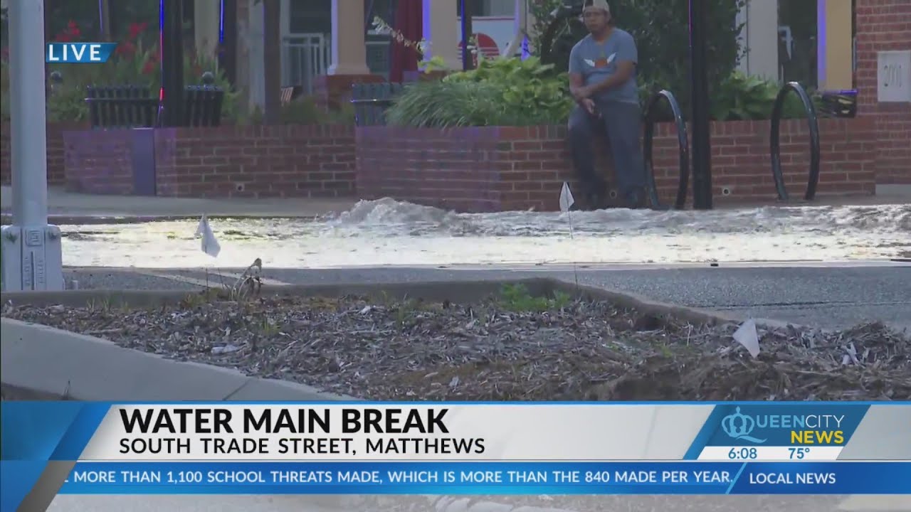 Water main break closes roads by downtown Matthews - YouTube