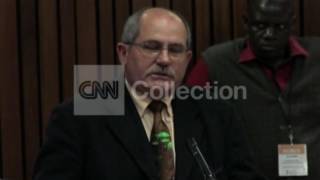 PISTORIUS TRIAL-BALLISTIC EXPERT NO GLOVES ON GUN