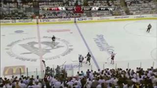 Jordan Leopold gets knocked out by Andy Sutton