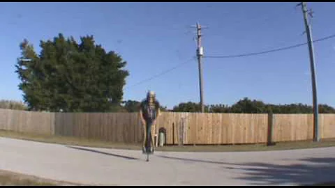Taylor Blaylock Jumps over moving car on pogo stick!
