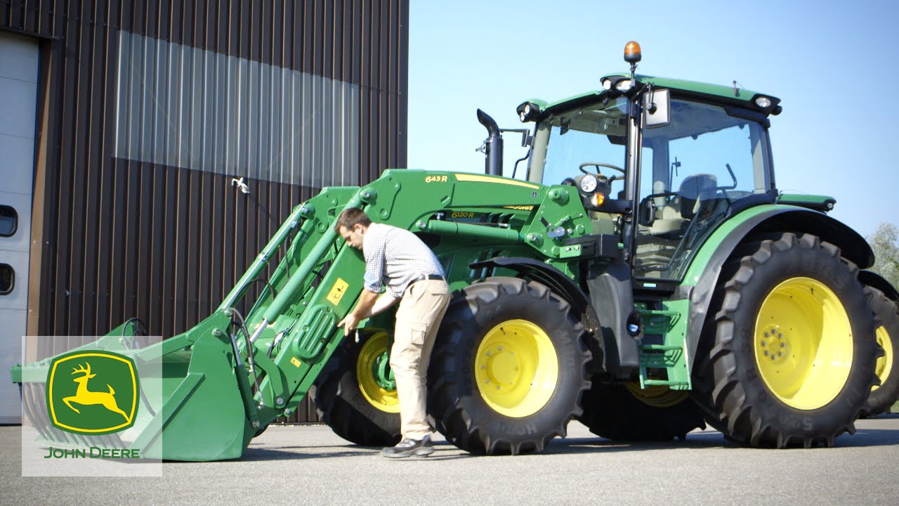 Ładowacze czołowe John Deere serii R - blokowanie i odblokowywanie