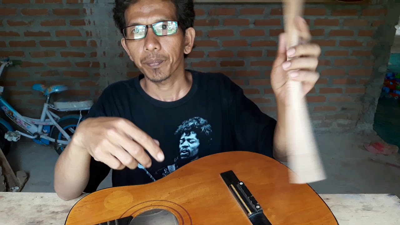 cara perbaiki top body gitar akustik yang cekung/cembung ketarik senar