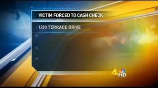 Anne McCloy Reports - Man Forced to Write Check to Robbers