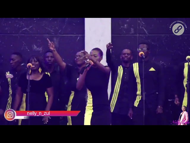 Nelly- Alimo Muno/Sangalala live ministration by one praise. class=