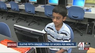 5th grader's fingers fly across the keyboard