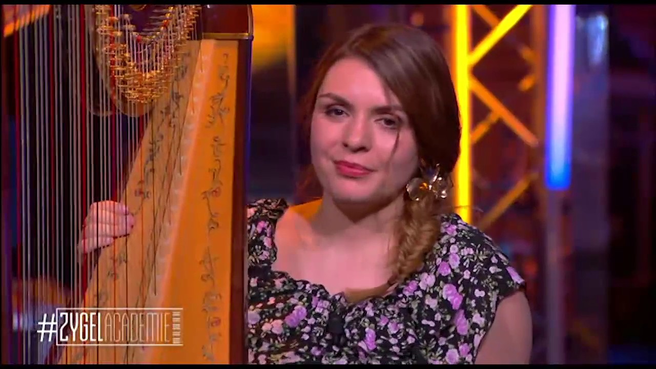 Pauline Haas (harp) plays "La source" during a TV show