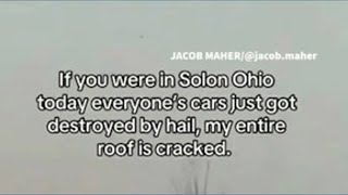 Large hail damages cars in Solon
