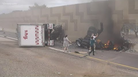 Witnesses rush to help after fiery crash on Arizona freeway
