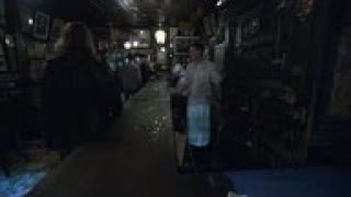 Last call: NYC bars close as virus deaths tick up