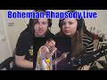 Couple first reaction to  queen bohemian rhapsody live